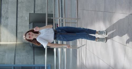 Stylish Girl Dancing in an Urban Setting