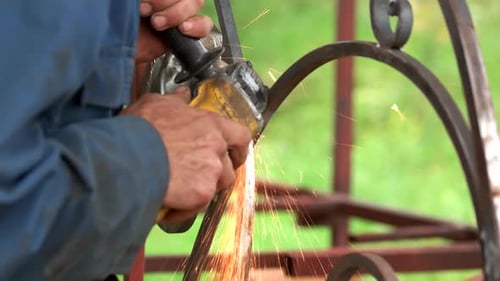 Worker Welding Metal Close Up