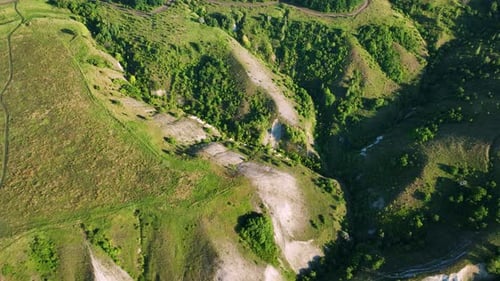 Drone View of Hills Fields and Chalk Mountains in Sunny Weather