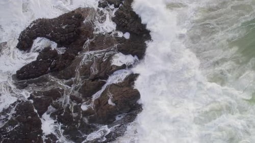 Ocean Waves Crashing Against the Rocky Shores