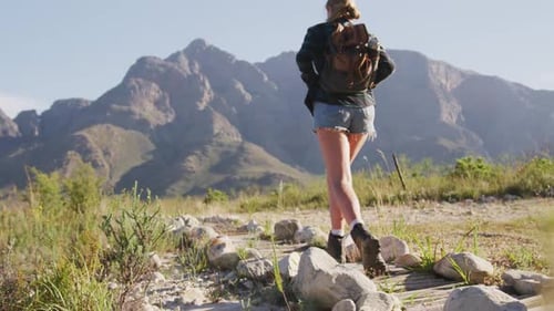 Side view man with prosthetic leg running