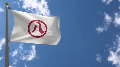 Waving Flag with Abstract Red Symbol Against Blue Sky