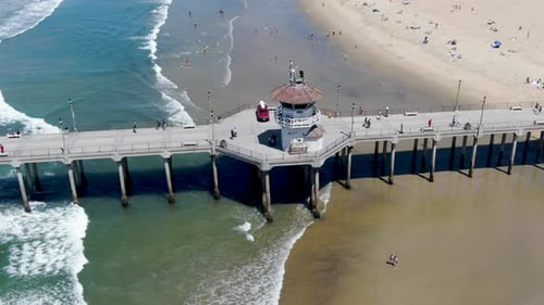 Huntington Pier with Lifeguard Tower for Surfer. Southeast of Los Angeles. California, USA.
