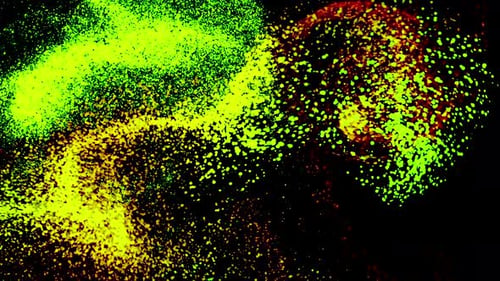 Abstrakter Fluss grüner und roter kleiner Punkte auf schwarzem Hintergrund