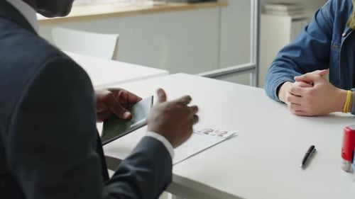 Visa Applicant Having Interview with Consulate Officer