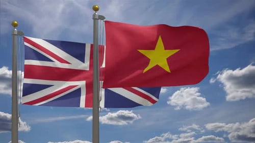 United Kingdom and Vietnam Flags Waving Together