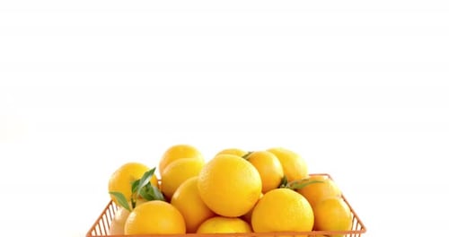 Close-up of sweet limes in basket