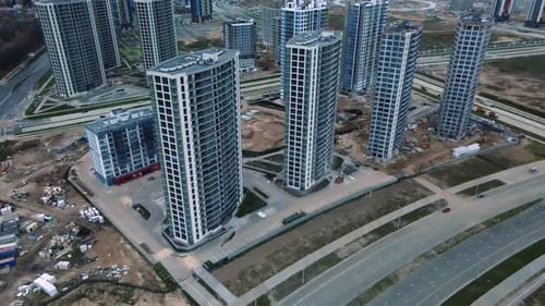 Construction of modern multi-storey buildings. Construction of a new city block.