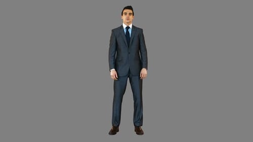 Man in Gray Suit Standing Still Facing Camera