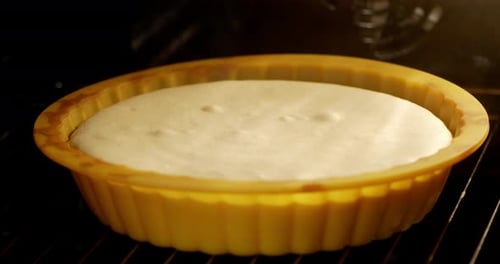 Cake Baking and Rising in the Oven