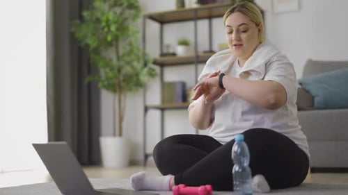Woman Checking Heart Rate