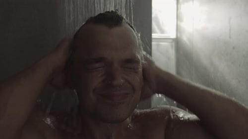 Caucasian man in the shower