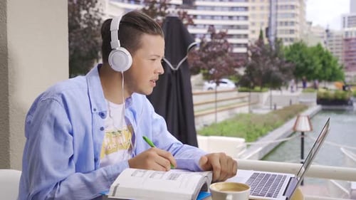 Male student in online lesson.