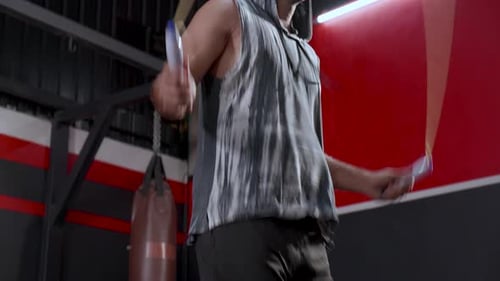 Close up of handsome man in the gym. Healthy lifestyle, guy training in gym