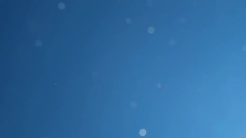 Water Droplets Against Blue Background