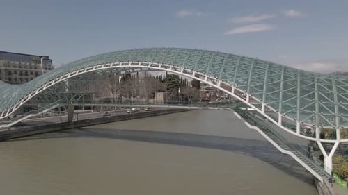 Tbilisi, Georgia - April 2 2021: Aerial view of Tbilisi city central park and Bridge of Peace.
