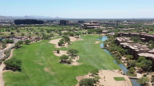 Scenic Golf Course with City in Background Aerial