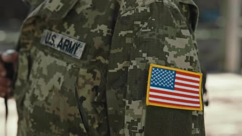 Close Up of Soldier with US Patch Flag on Army Uniform