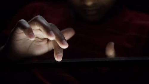 Close Up of Young Man Hand Using Smart Phone at Night