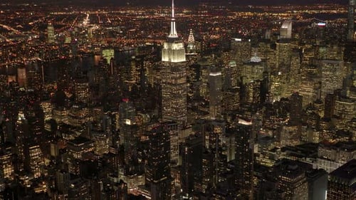 Establishing Shot of High Rise Buildings in New York City at Night