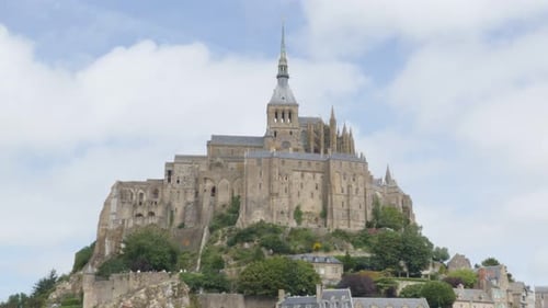 Mont Saint Michel in front of blue sky Normandy France 4K 3840X2160 UHD video - Mt Saint Michel fa