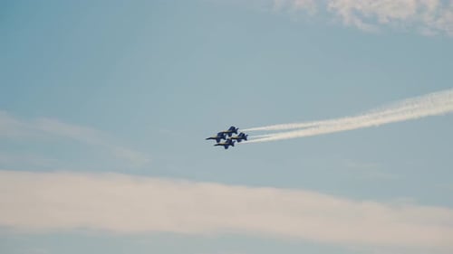 Jets Fly in Formation Leaving Vapor Trails