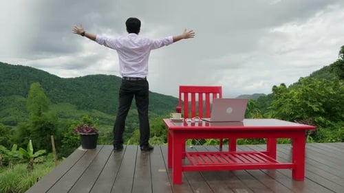 Man Relaxed With Beautiful View