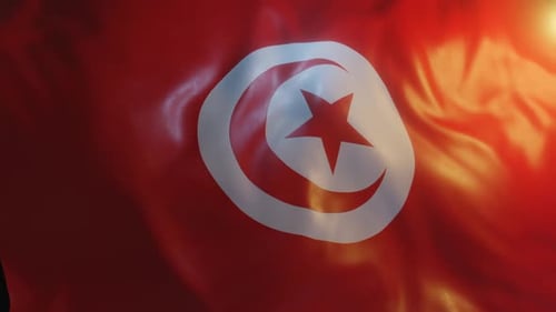 Tunisia National Flag Waving with Sun Flare Effect
