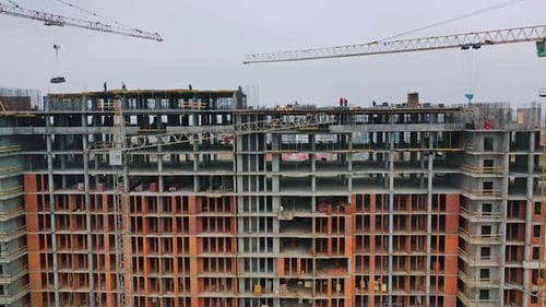 construction of a residential apartment complex. Multi-storey building under construction.
