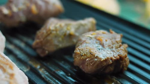 The Chef Grills Pork and Beef on the Grill