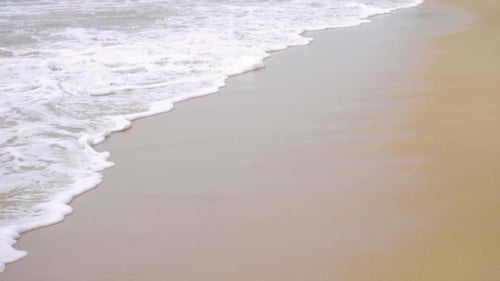 Waves on a Sandy Beach