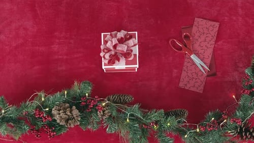 Assorted Christmas Gifts Placed in Festive Flat Lay