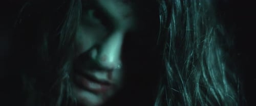 Dark Close Up of Bloody Face