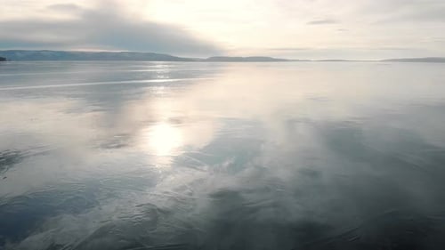 The Winter Landscape of the Freezing River, The Ice Reflects the Sky