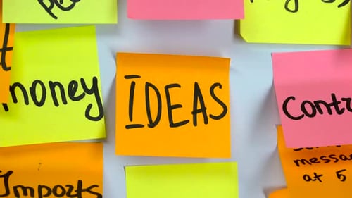 Brainstorming Ideas on Colorful Sticky Notes