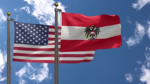 American and Austrian National Flags Waving Against Clear Sky