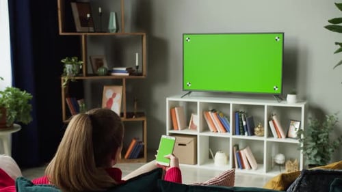 Woman Using Smartphone with Chroma Green Screen