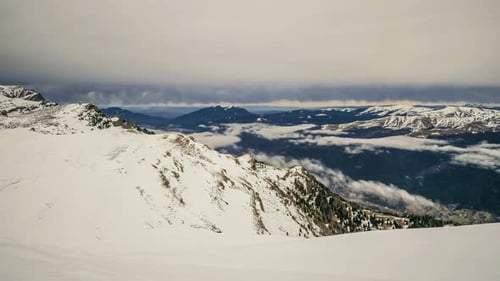 Peaks Of Mountains Above The Clouds