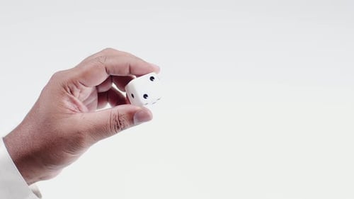 Hand Holds White Dice One To Six