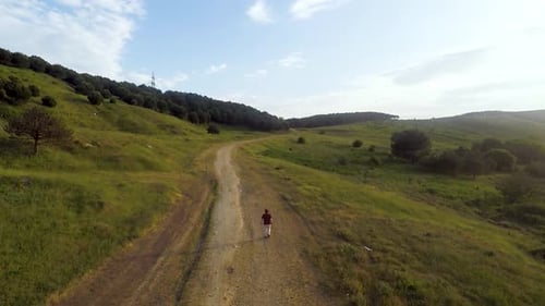 Aerial Man Walking in Nature