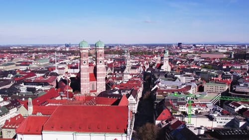 Aerial drone shot flying above the beautiful city of Munich, Germany.
