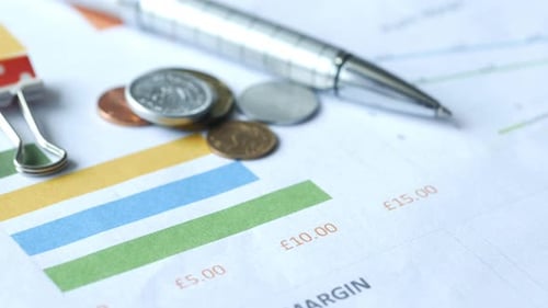 Financial Graph Calculator and Notepad on Table