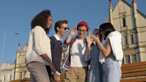Happy Friends Students High Five for Their Teamwork After School.