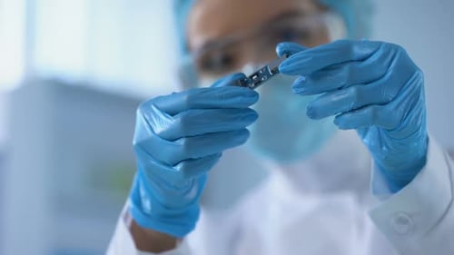 Lab Technician Checking Microcircuit, Computer Developing Center, Innovation