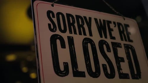 Sorry We're Closed Sign at Night