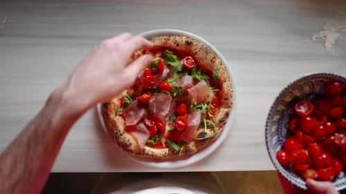 Adding Fresh Tomatoes to Pizza, Overhead View