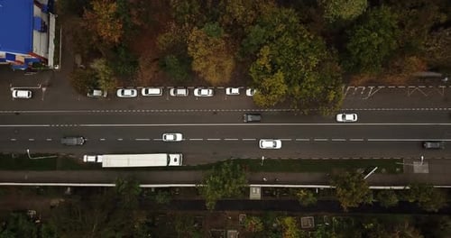 Drone View From Above to the Road Traffic in Autumn Time
