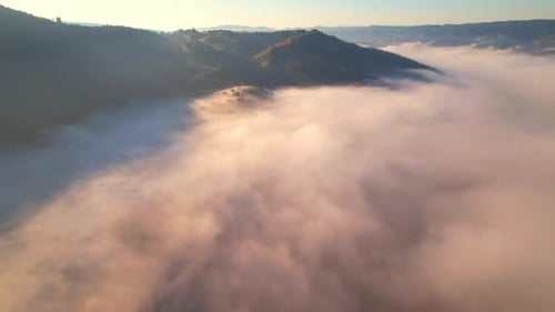 4K Aerial view of Mountains landscape with morning fog.