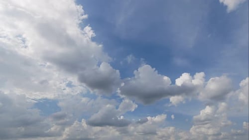 Time lapse of white cloud moving pass around sky background