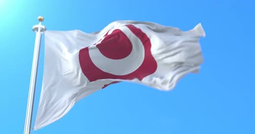 Abstract Red Symbol Flag Waving in Clear Blue Sky
